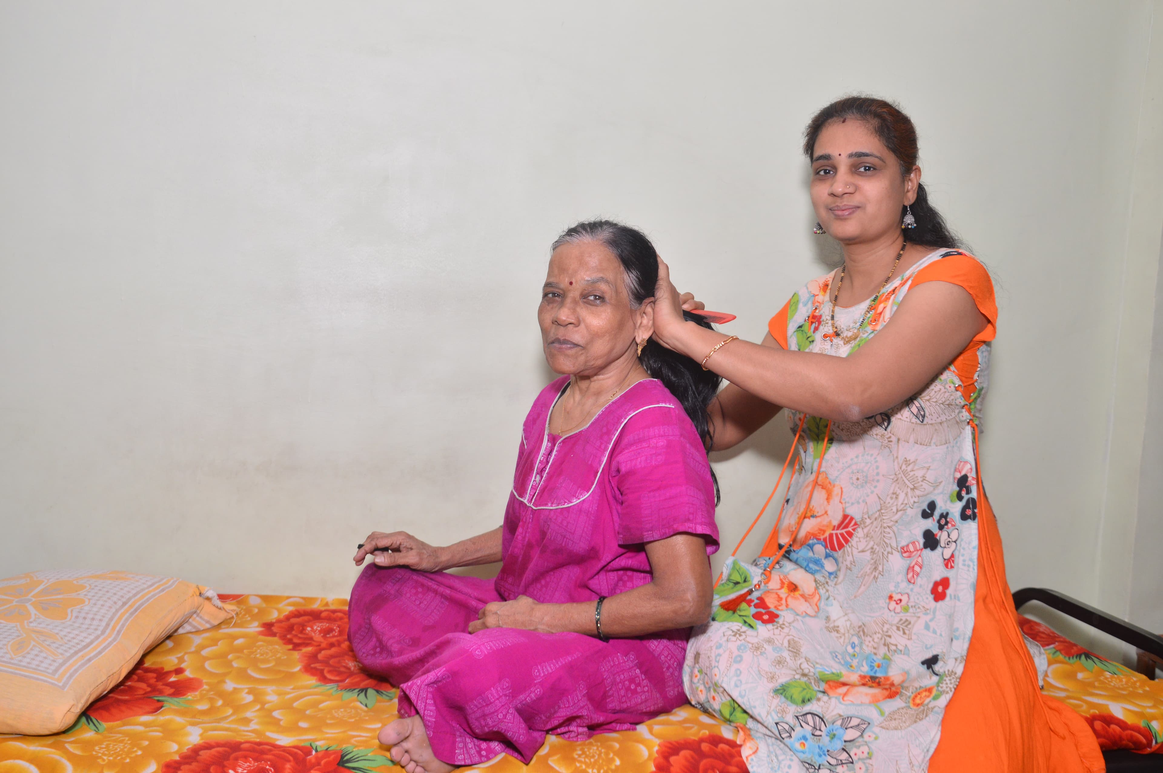 A woman taking care of sick elderly